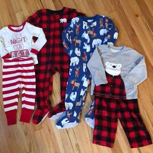 Four pairs of 2T boy winter pajamas.